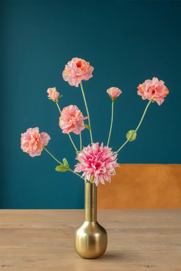 Jula Bloom’s Jacinda silk flower bouquet with peach and pink blooms, in a small gold vase