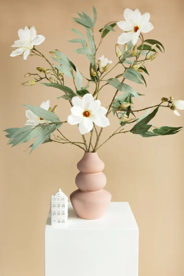 Jula Bloom’s Nightingale silk flower bouquet with large white blooms, in a light pink vase