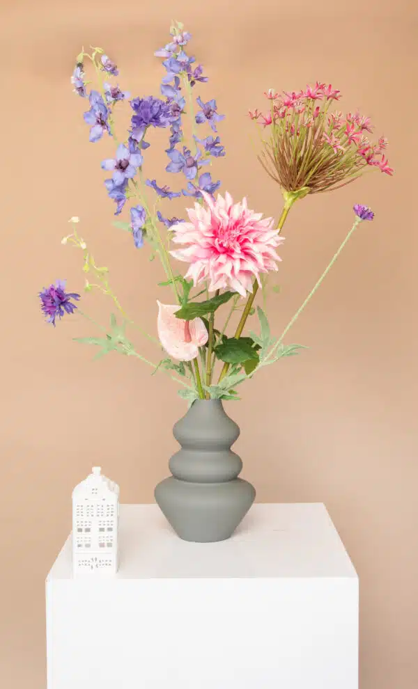 Jula Bloom’s Robinson silk flower bouquet with purple and pink blooms, in a grey vase