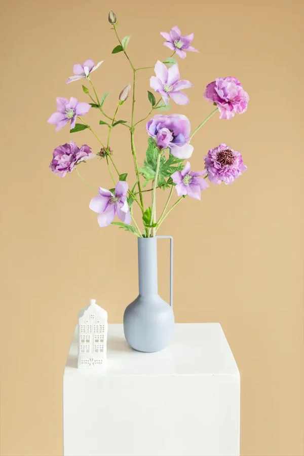 Jula Bloom’s Juliana silk flower bouquet with purple blooms in a grey vasewhite pilla