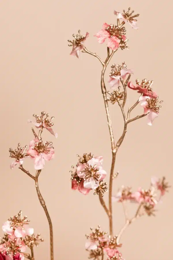 Jula Bloom’s Austen silk flower bouquet with pink blooms and gold brances